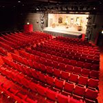 Photo of theatre seats facing the stage